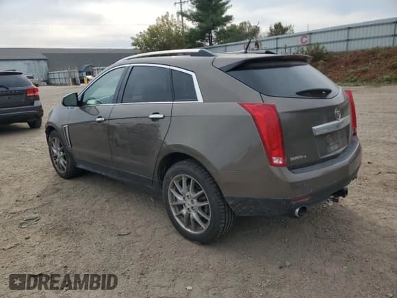 ✅ 2014 Cadillac SRX Performance Collection • VIN: 3GYFNFE3XES667623 • Lot: 86767115. Listed on Copart with 121,304 mi. Free auction sales archive from the USA and detailed vehicle history report at DreamBid. Image 2.