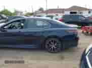 2021 Toyota Camry SE with VIN 4T1T11BKXMU020152, listed as a IAAI auction lot 42412484 with 39,274 mi miles and . Bid and sale history available at DreamBid. Image 3.