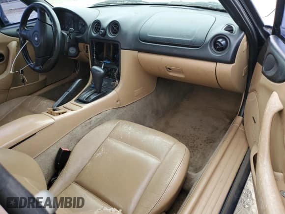 ✅ 1999 Mazda MX-5 Miata • VIN: JM1NB3534X0108667 • Lot: 84275075. Listed on Copart with 159,579 mi. Free auction sales archive from the USA and detailed vehicle history report at DreamBid. Image 8.