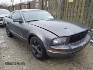 ✅ 2007 Ford Mustang Deluxe • VIN: 1ZVFT80N275370601 • Lot: 43842084. Listed on IAAI with 164,952 mi. Free auction sales archive from the USA and detailed vehicle history report at DreamBid. Image 1.