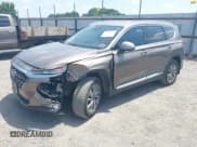 ✅ 2020 Hyundai Santa Fe SEL • VIN: 5NMS33AD3LH261307 • Lot: 42940601. Listed on IAAI with 95,444 mi. Free auction sales archive from the USA and detailed vehicle history report at DreamBid. Image 17.