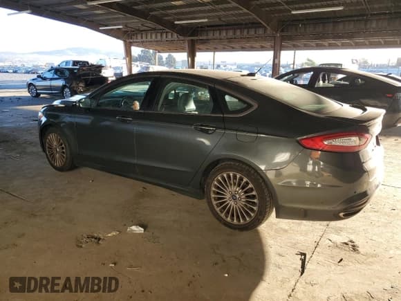 ✅ 2015 Ford Fusion Titanium • VIN: 3FA6P0K9XFR183925 • Лот: 85379335. Опубликован ранее на Copart с пробегом 135 895 миль. Бесплатный доступ к архиву аукционных продаж из США и подробный отчёт об истории автомобиля на DreamBid. Изображение 2.