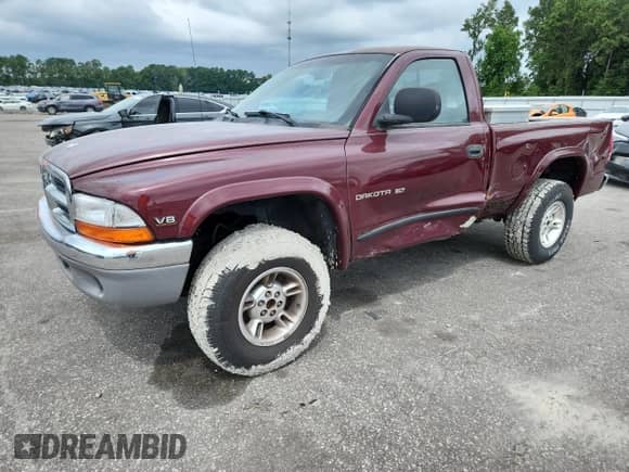 2000 Dodge Dakota Sport z VIN 1B7GG26N5YS650791, wystawiony jako Copart lot #63601765 z przebiegiem 80 841 mil mil oraz Szkoda całkowita • Salvage title. Historia ofert i sprzedaży dostępna na DreamBid. Obrazek 1.