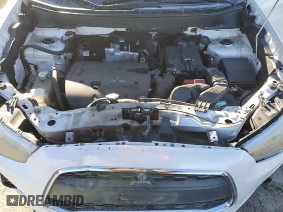 2013 Mitsubishi Outlander LE with VIN 4A4AP5AU0DE022676, listed as a Copart auction lot 86818835 with 221,484 mi miles and Salvage title. Bid and sale history available at DreamBid. Image 12.