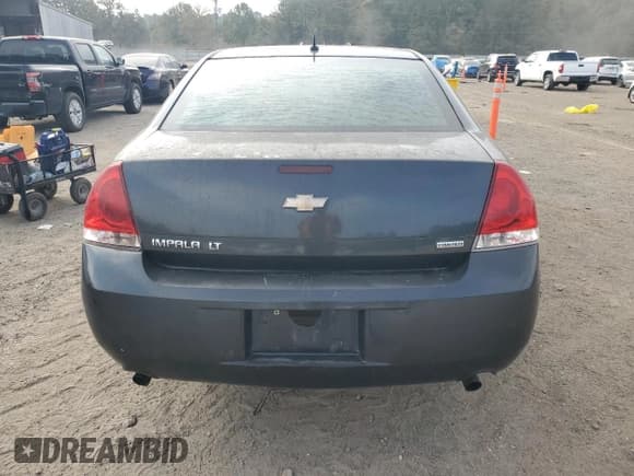 ✅ 2014 Chevrolet Impala LT • VIN: 2G1WB5E37E1184832 • Lot: 87480965. Wystawiony na Copart z przebiegiem 162 178 mil. Bezpłatny archiwum sprzedaży aukcyjnych z USA i szczegółowy raport historii pojazdu na DreamBid. Zdjęcie 6.