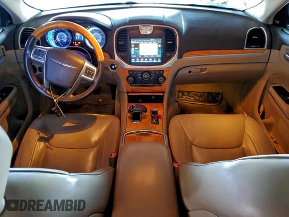 ✅ 2012 Chrysler 300 Limited • VIN: 2C3CCACG7CH180729 • Lot: 94340755. Listed on Copart with 153,723 mi. Free auction sales archive from the USA and detailed vehicle history report at DreamBid. Image 8.