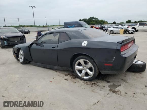 ✅ 2013 Dodge Challenger R/T Plus • VIN: 2C3CDYBT6DH729097 • Lot: 52572444. Wystawiony na Copart z przebiegiem 156 221 mil. Bezpłatny archiwum sprzedaży aukcyjnych z USA i szczegółowy raport historii pojazdu na DreamBid. Zdjęcie 2.