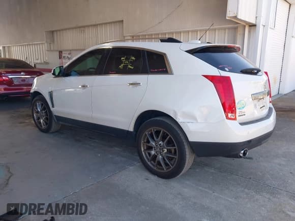 ✅ 2016 Cadillac SRX Performance Collection • VIN: 3GYFNCE30GS565930 • Lot: 43711639. Listed on IAAI with 112,092 mi. Free auction sales archive from the USA and detailed vehicle history report at DreamBid. Image 3.