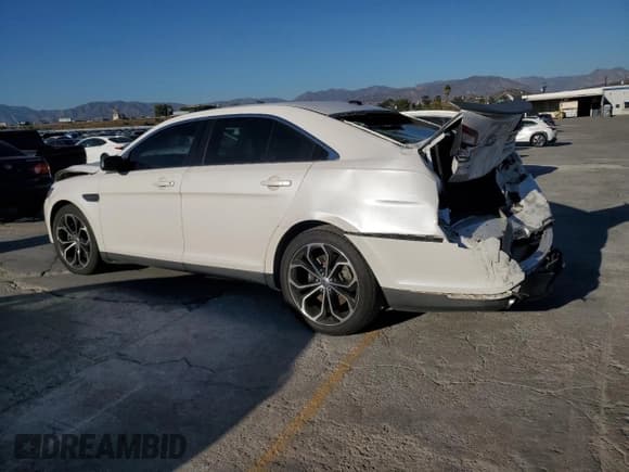 ✅ 2013 Ford Taurus SHO • VIN: 1FAHP2KT4DG140508 • Lot: 82628395. Listed on Copart with 148,897 mi. Free auction sales archive from the USA and detailed vehicle history report at DreamBid. Image 2.
