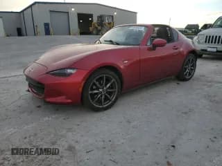 ✅ 2019 Mazda MX-5 Miata Grand Touring • VIN: JM1NDAM71K0304853 • Lot: 93338525. Listed on Copart with 58,693 mi. Free auction sales archive from the USA and detailed vehicle history report at DreamBid. Image 1.