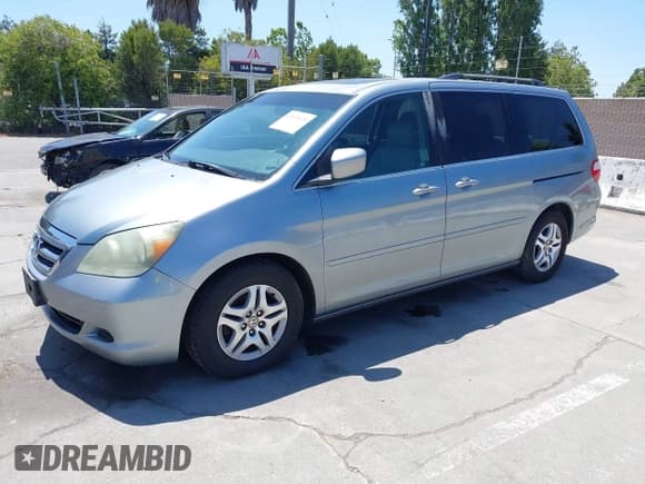 ✅ 2006 Honda Odyssey EX-L • VIN: 5FNRL38716B051664 • Lot: 42520320. Listed on IAAI with 304,835 mi. Free auction sales archive from the USA and detailed vehicle history report at DreamBid. Image 2.