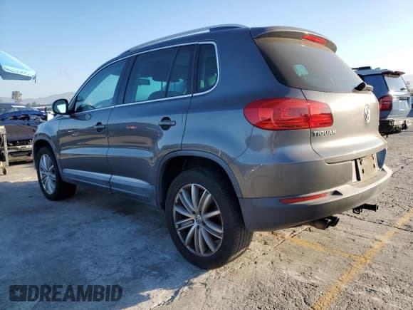 ✅ 2013 Volkswagen Tiguan SE • VIN: WVGBV7AX2DW010185 • Lot: 69625895. Listed on Copart with 134,760 mi. Free auction sales archive from the USA and detailed vehicle history report at DreamBid. Image 2.