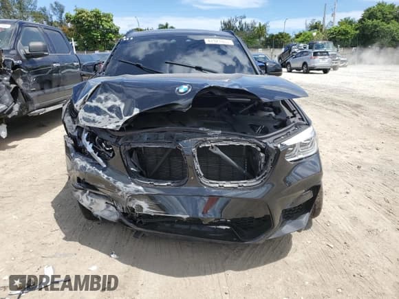 ✅ 2021 BMW X4 M • VIN: 5YMUJ0C01M9H09798 • Лот: 47921083. Опубликован ранее на Copart с пробегом 32 940 миль. Бесплатный доступ к архиву аукционных продаж из США и подробный отчёт об истории автомобиля на DreamBid. Изображение 5.