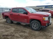✅ 2021 GMC Canyon 4WD AT4 • VIN: 1GTG6FEN6M1276977 • Lot: 55390425. Listed on Copart with 70,318 mi. Free auction sales archive from the USA and detailed vehicle history report at DreamBid. Image 4.