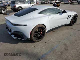 ✅ 2020 Aston Martin Vantage • VIN: SCFSMGAW1LGN03400 • Лот: 83032844. Опубликован ранее на Copart с пробегом 27 500 миль. Бесплатный доступ к архиву аукционных продаж из США и подробный отчёт об истории автомобиля на DreamBid. Изображение 3.