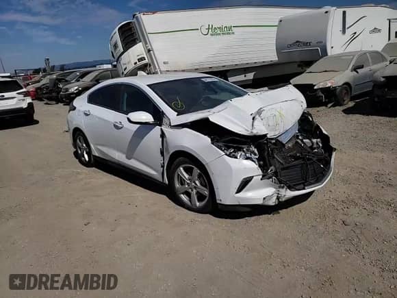 2016 Chevrolet Volt LT z VIN 1G1RC6S53GU123314, wystawiony jako Copart lot #64171373 z przebiegiem Nie podano mil oraz . Historia ofert i sprzedaży dostępna na DreamBid. Obrazek 13.