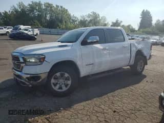 2020 Ram 1500 Laramie с VIN 1C6SRFJT7LN358494, выставлен на аукционе Copart как лот 69302445 с пробегом 64 437 миль миль и Списание • Salvage title. История ставок и продаж доступна на DreamBid. Изображение 1.