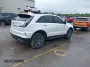 ✅ 2024 Cadillac XT4 AWD Sport • VIN: 1GYFZFR40RF223782 • Lot: 42295745. Listed on IAAI with 7,254 mi. Free auction sales archive from the USA and detailed vehicle history report at DreamBid. Image 4.