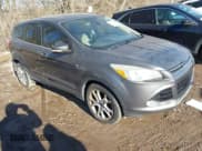 ✅ 2013 Ford Escape SEL • VIN: 1FMCU9H93DUC63778 • Lot: 43889430. Listed on IAAI with 196,238 mi. Free auction sales archive from the USA and detailed vehicle history report at DreamBid. Image 1.