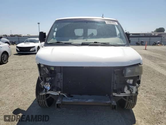 2014 Chevrolet Express Passenger 1LT with VIN 1GNSGCF43E1130315, listed as a Copart auction lot 69969665 with 148,721 mi miles and Salvage title. Bid and sale history available at DreamBid. Image 5.