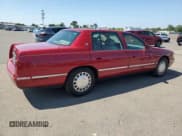 ✅ 1999 Cadillac DeVille • VIN: 1G6KD54Y7XU723747 • Lot: 59883975. Listed on Copart with 82,049 mi. Free auction sales archive from the USA and detailed vehicle history report at DreamBid. Image 3.