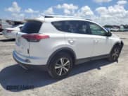✅ 2018 Toyota RAV4 XLE • VIN: JTMWFREVXJD127480 • Lot: 61004625. Listed on Copart with 33,179 mi. Free auction sales archive from the USA and detailed vehicle history report at DreamBid. Image 3.