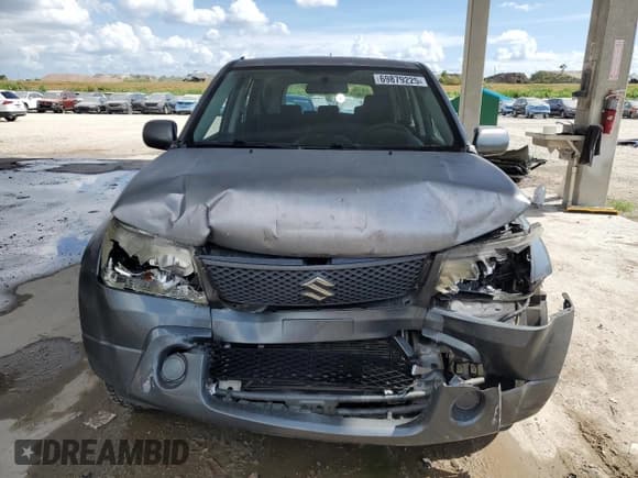 ✅ 2006 Suzuki Grand Vitara • VIN: JS3TE941464100773 • Lot: 69879225. Listed on Copart with 80,725 mi. Free auction sales archive from the USA and detailed vehicle history report at DreamBid. Image 5.