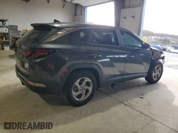 2022 Hyundai Tucson SE with VIN 5NMJA3AE5NH052759, listed as a Copart auction lot 90626665 with 58,295 mi miles and Salvage title. Bid and sale history available at DreamBid. Image 3.