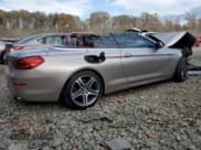 ✅ 2016 BMW 6 Series 650i xDrive • VIN: WBA6F7C50GD930473 • Лот: 79723834. Опубликован ранее на Copart с пробегом 100 131 миль. Бесплатный доступ к архиву аукционных продаж из США и подробный отчёт об истории автомобиля на DreamBid. Изображение 3.