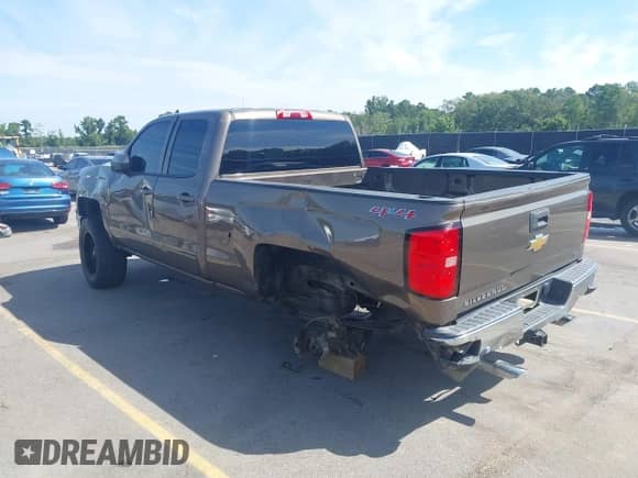 2015 Chevrolet Silverado 1500 LT z VIN 1GCVKREC6FZ161108, wystawiony jako IAAI lot #43074690 z przebiegiem 198 960 mil mil oraz . Historia ofert i sprzedaży dostępna na DreamBid. Obrazek 3.