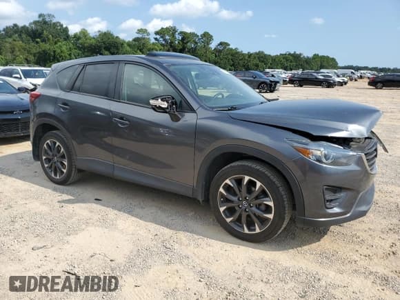 ✅ 2016 Mazda CX-5 Grand Touring • VIN: JM3KE2DY0G0850105 • Lot: 69781115. Listed on Copart with 86,615 mi. Free auction sales archive from the USA and detailed vehicle history report at DreamBid. Image 4.
