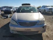 ✅ 2002 Toyota Camry LE • VIN: JTDBE32K520020340 • Lot: 91112395. Listed on Copart with 140,537 mi. Free auction sales archive from the USA and detailed vehicle history report at DreamBid. Image 5.