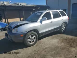 2001 Hyundai Santa Fe GLS z VIN KM8SC83D51U097893, wystawiony jako Copart lot #42773215 z przebiegiem 113 181 mil mil oraz Szkoda całkowita • Salvage title. Historia ofert i sprzedaży dostępna na DreamBid. Obrazek 1.