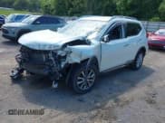 ✅ 2017 Nissan Rogue SL • VIN: 5N1AT2MT5HC884728 • Lot: 42330244. Listed on IAAI with 89,744 mi. Free auction sales archive from the USA and detailed vehicle history report at DreamBid. Image 2.