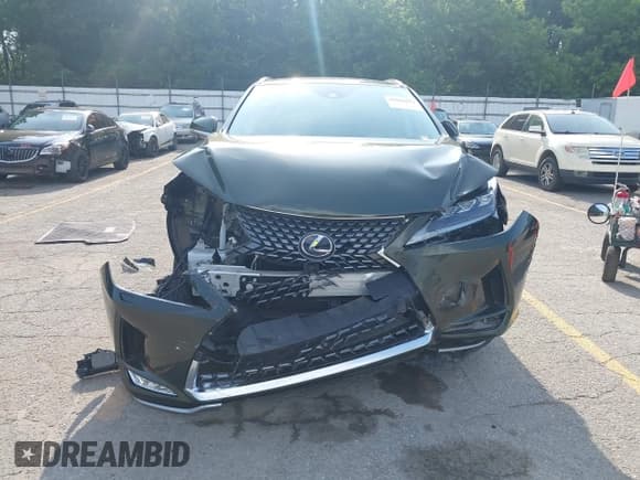 ✅ 2022 Lexus RX 450h • VIN: 2T2JGMDA1NC077818 • Lot: 42568671. Listed on IAAI with 67,734 mi. Free auction sales archive from the USA and detailed vehicle history report at DreamBid. Image 12.