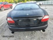 ✅ 1998 Jaguar XK • VIN: SAJGX5240WC025982 • Lot: 63363405. Listed on Copart with 60,641 mi. Free auction sales archive from the USA and detailed vehicle history report at DreamBid. Image 6.