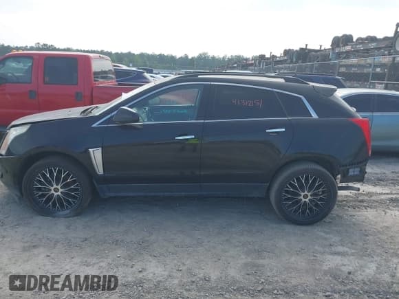 ✅ 2015 Cadillac SRX • VIN: 3GYFNAE38FS593171 • Lot: 42274159. Wystawiony na IAAI z przebiegiem 104 049 mil. Bezpłatny archiwum sprzedaży aukcyjnych z USA i szczegółowy raport historii pojazdu na DreamBid. Zdjęcie 15.