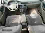 2000 Chevrolet Malibu LS z VIN 1G1NE52J8Y6105221, wystawiony jako Copart lot #85044634 z przebiegiem 70 878 mil mil oraz Czysty tytuł • Clean title. Historia ofert i sprzedaży dostępna na DreamBid. Obrazek 8.