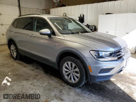 ✅ 2020 Volkswagen Tiguan S • VIN: 3VV0B7AX8LM113955 • Lot: 84452755. Listed on Copart with 30,970 mi. Free auction sales archive from the USA and detailed vehicle history report at DreamBid. Image 4.