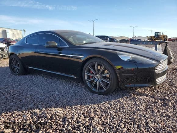 ✅ 2012 Aston Martin Rapide • VIN: SCFHDDAJ7CAF02268 • Lot: 80471763. Wystawiony na Copart z przebiegiem 42 790 mil. Bezpłatny archiwum sprzedaży aukcyjnych z USA i szczegółowy raport historii pojazdu na DreamBid. Zdjęcie 4.