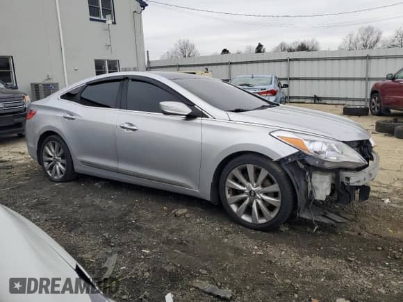 2012 Hyundai Azera with VIN KMHFH4JG3CA192580, listed as a Copart auction lot 82609194 with 127,887 mi miles and Salvage title. Bid and sale history available at DreamBid. Image 4.