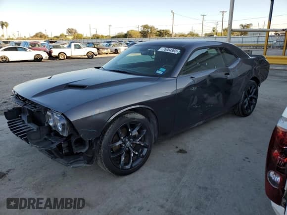 ✅ 2022 Dodge Challenger SXT • VIN: 2C3CDZAG2NH211886 • Lot: 76064993. Wystawiony na Copart z przebiegiem 15 220 mil. Bezpłatny archiwum sprzedaży aukcyjnych z USA i szczegółowy raport historii pojazdu na DreamBid. Zdjęcie 1.