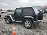 ✅ 2010 Jeep Wrangler Sahara • VIN: 1J4AA5D18AL228503 • Lot: 83669344. Listed on Copart with 117,283 mi. Free auction sales archive from the USA and detailed vehicle history report at DreamBid. Image 2.