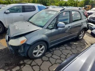 ✅ 2009 Suzuki SX4 Touring AWD • VIN: JS2YB417396203173 • Lot: 71964165. Wystawiony na Copart z przebiegiem 224 117 mil. Bezpłatny archiwum sprzedaży aukcyjnych z USA i szczegółowy raport historii pojazdu na DreamBid. Zdjęcie 1.