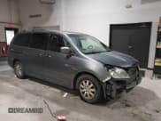 ✅ 2010 Honda Odyssey EX-L • VIN: 5FNRL3H69AB039892 • Lot: 43572448. Listed on IAAI with 219,317 mi. Free auction sales archive from the USA and detailed vehicle history report at DreamBid. Image 1.