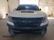 ✅ 2018 Chevrolet Colorado 4WD ZR2 • VIN: 1GCPTEE11J1188334 • Лот: 87228985. Опубликован ранее на Copart с пробегом 108 574 миль. Бесплатный доступ к архиву аукционных продаж из США и подробный отчёт об истории автомобиля на DreamBid. Изображение 5.