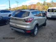 ✅ 2017 Ford Escape SE • VIN: 1FMCU9GD9HUC58130 • Lot: 43610717. Listed on IAAI with 147,188 mi. Free auction sales archive from the USA and detailed vehicle history report at DreamBid. Image 4.