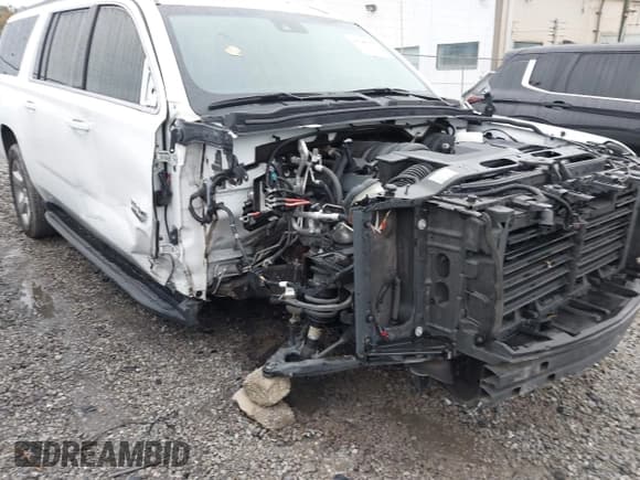 ✅ 2020 Chevrolet Suburban LT • VIN: 1GNSCHKCXLR225409 • Lot: 43545085. Listed on IAAI with 71,992 mi. Free auction sales archive from the USA and detailed vehicle history report at DreamBid. Image 18.