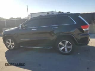 ✅ 2014 Jeep Grand Cherokee Overland • VIN: 1C4RJFCM2EC384956 • Лот: 90483375. Опубликован ранее на Copart с пробегом 124 017 миль. Бесплатный доступ к архиву аукционных продаж из США и подробный отчёт об истории автомобиля на DreamBid. Изображение 2.