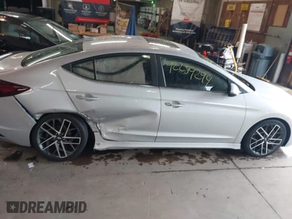 ✅ 2019 Hyundai Elantra Sport • VIN: KMHD04LB0KU887208 • Lot: 42259299. Listed on IAAI with 104,142 mi. Free auction sales archive from the USA and detailed vehicle history report at DreamBid. Image 13.